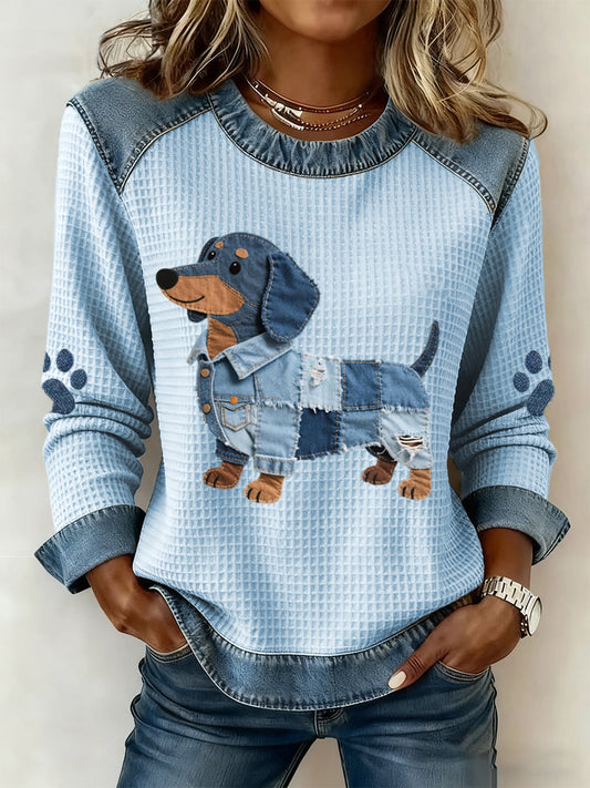 Dames sweatshirt met patchworkmotief in een prachtig dachshundpatroon